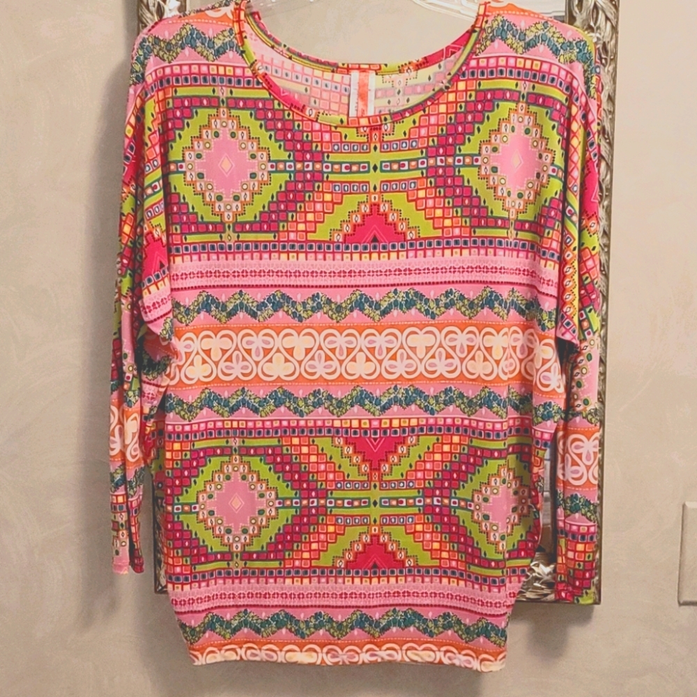 Vibrant Tunic W/ Colorful designs. Fun Funky Fashion!!!
